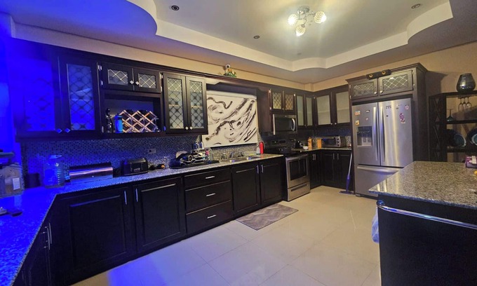 Claxton Bay Casa | This spacious property features a fully equipped kitchen, and an inviting small pool