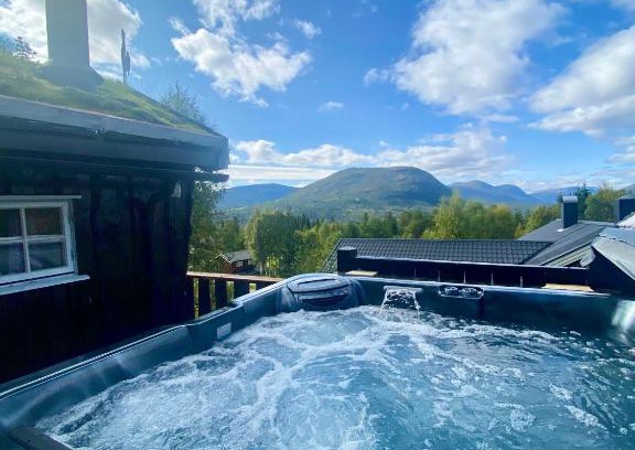 Bjorli Casa | Three bedroom holiday house with jacuzzi in Bjorli , pets allowed