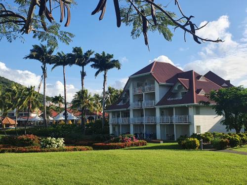 Gros Raisins Apartamento | Ti Rhum Passion vue mer dans célèbre Village de Vacances