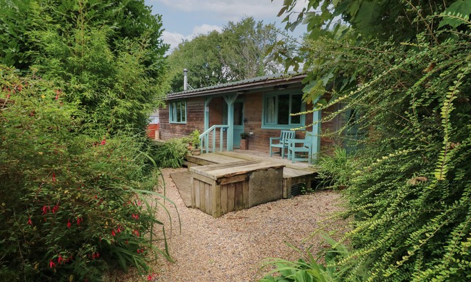 Cosheston Cabaña | TIMBERTWIG LODGE, pet friendly, with open fire in Pembroke