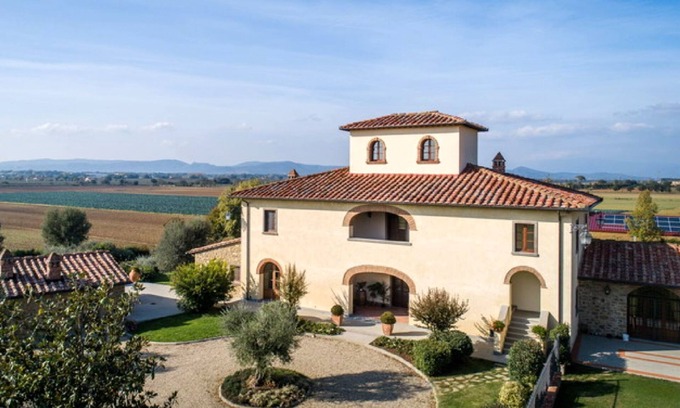 Puliciano Casa | Estancia vacacional atemporal en la Toscana
