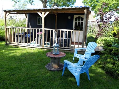 Oterleek Apartamento | Tinyhouse NATUURHUISJE met veranda Bij de Molen tussen Alkmaar en Hoorn