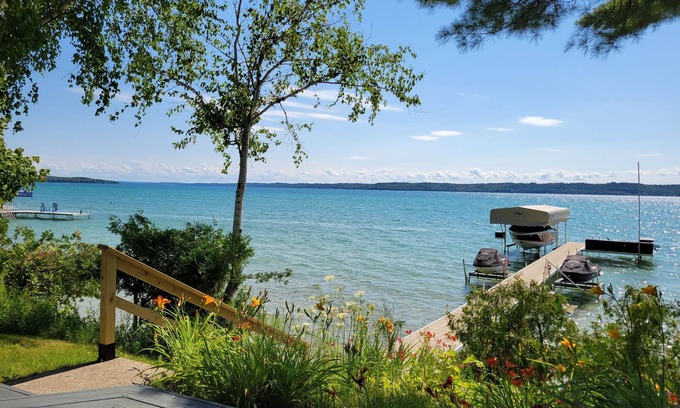 Bellaire Cabaña | TorchLakeFlightDeck.com cottage with 180’ on Lakefront Waterfront Beachfront!