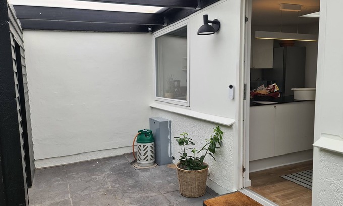 Naesby Condominio | Townhouse with wooden terrace
