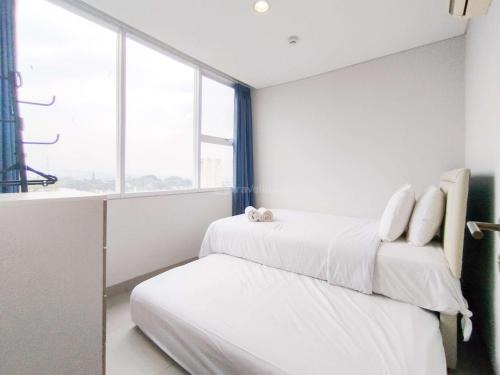 Dago Apartamento | Tranquil Designed 2BR Apartment Dago Suites By Travelio