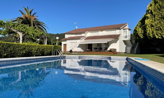 Buezas Casa | Tranquilidad con piscina en Casa Nantes en Sanxenxo
