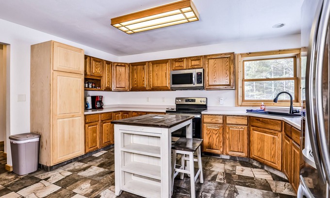 Mercer Casa | Tree-lined home with gas grill, firepit, & fireplace - walk to lake