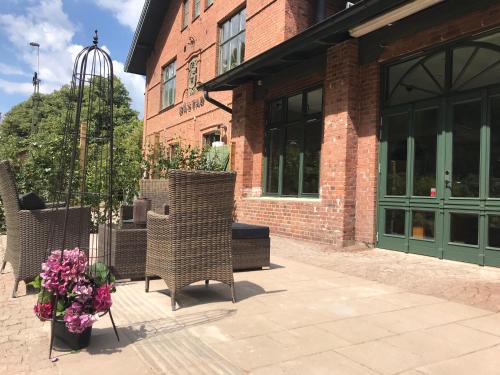Bastad Casa | Tree Top Hill - The Old Station House - Båstad Holiday Apartments