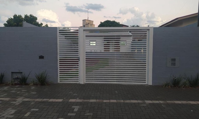 Jardim Casa | Trentino 66 - Hospedagem em Ijuí, casa agradável com estacionamento