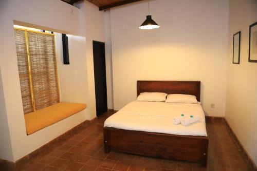 Milagiriya Cama Y Desayuno | TricycleBnB & Cafe