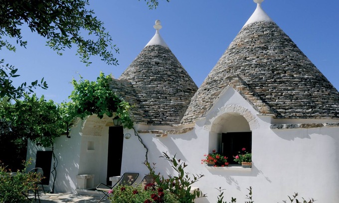 Martina Franca Casa | El Trullo del Melograno es una estructura acogedora y romántica para familias.