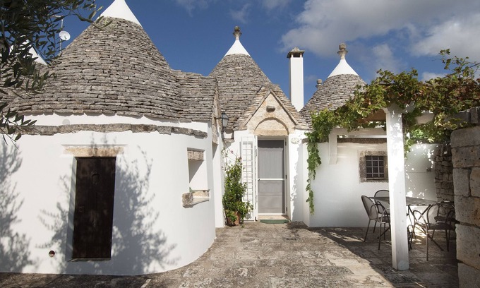 Martina Franca Casa | "Il Trullo dell 'Ulivo es un establecimiento acogedor y romántico de gestión familiar.