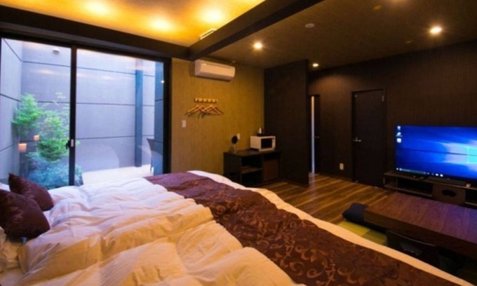 Oita Hotel | Twin beds tatami onsen openair jacuzzi bath / Oita Ōita