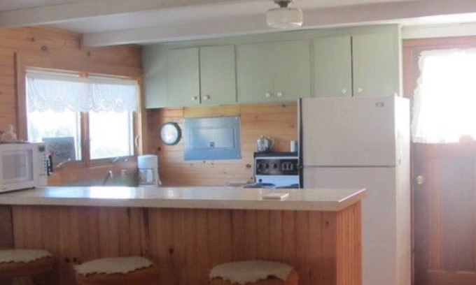 Morell Cabaña | Two Bedroom Cottage With Open Concept Leading To Large Patio And Screened Porch.
