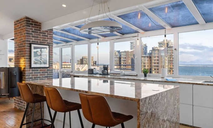 Hliðar Apartamento | Two Penthouse Apartments on Same Floor