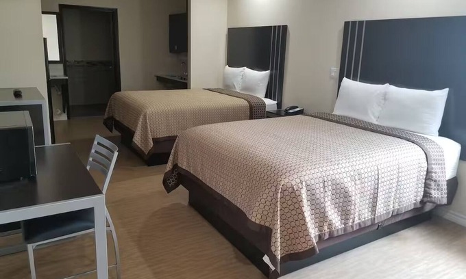 Bay City Hotel | Two Queen Non-Smoking Room, Scottish Inns and Suites Bay City TX, Free Parking
