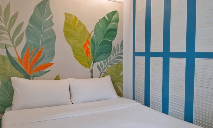 Guadalupe Apartamento | Two separate studio units on the same floor of a midrise condominium building.