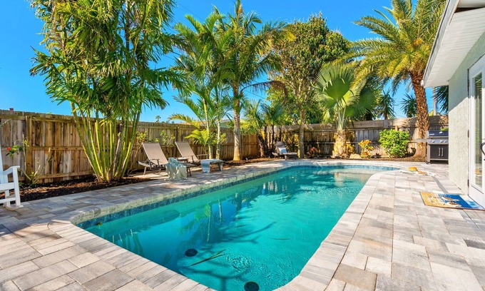 Seacoast Shores Casa | Beach Oasis: Heated Pool & Games, Pet-Friendly - 5 Min Walk to Beach