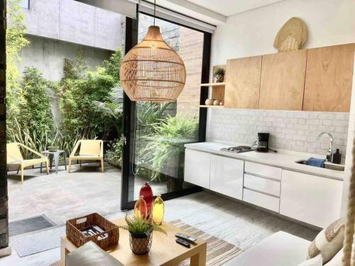 Financial District Apartamento | Unique Loft Design, Zona G with Private Terrace