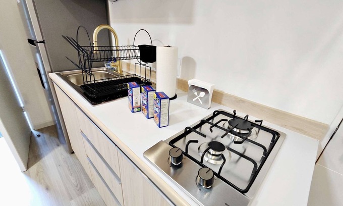 Granada Apartamento | Elegancia Urbana: Amplio Loft con Cama King