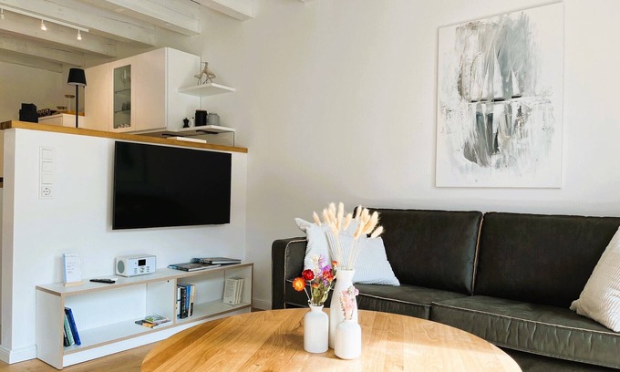 Rysum Apartamento | Vacation apartment Bütz - vacation in the historic Gulfhof with modern comfort