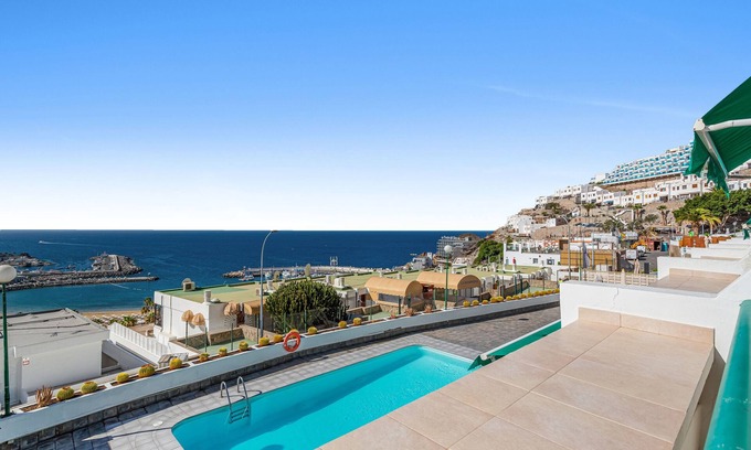Puerto Rico Apartamento | Apartamento de vacaciones 'Calipso Sun and Beach' con vistas al mar, Wi-Fi y aire acondicionado