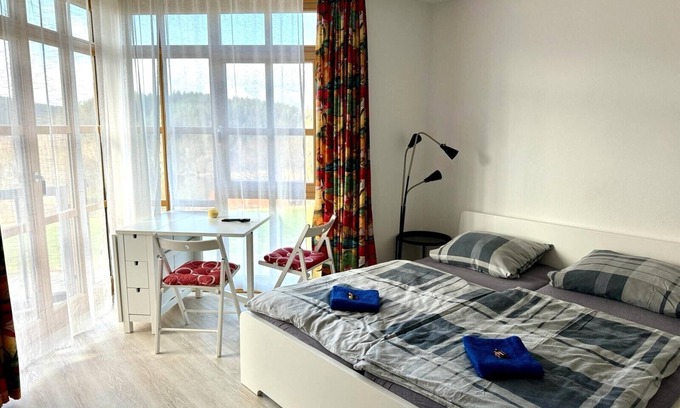 Hillstett Apartamento | Fantástica vista sobre el lago y los bosques. Apartamento con garantía de bienestar.