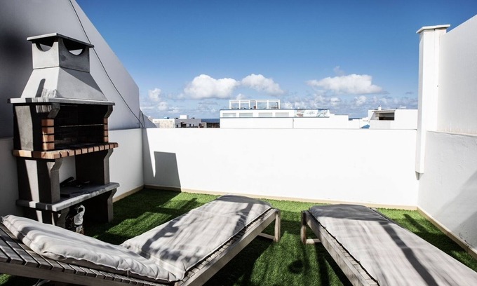 El Cotillo Casa | Casa de vacaciones 'Amura House' con jardín privado, balcón y Wi-Fi