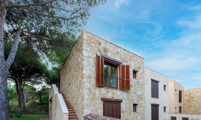 Narbolia Casa | Casa de vacaciones "Antonella Sul Golf" con piscina compartida, terraza privada y Wi-Fi