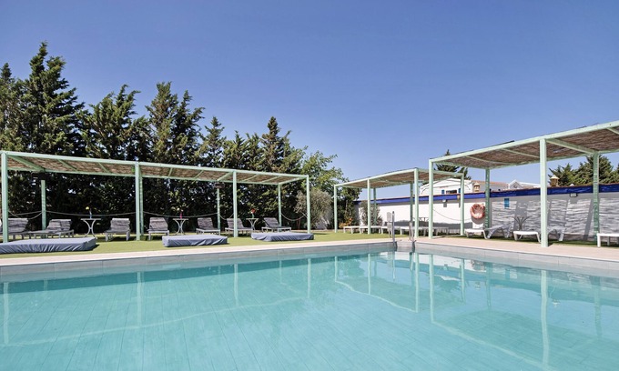 Medina-Sidonia Casa | Casa de vacaciones "Bungalow La Villoria Estandar 1" con piscina compartida, terraza privada y Wi-Fi