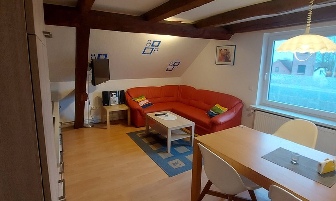 Eckwarden Apartamento | Vacation home Herter, WiFi, garden, play equipment, lounger / play area, barbecue