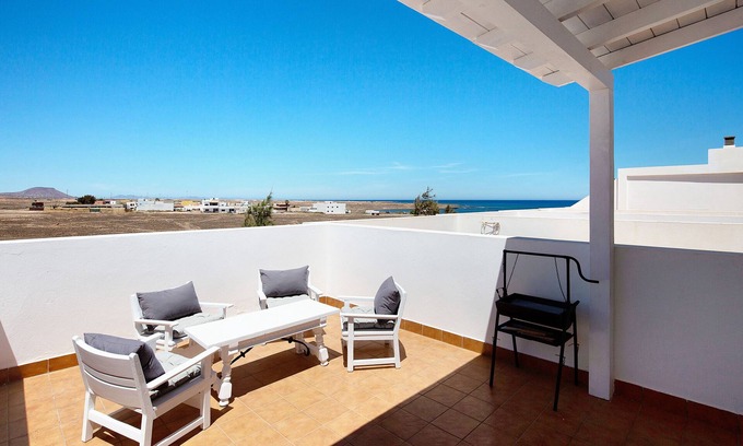 Puerto Lajas Casa | Casa de vacaciones "Tranquilidad En La Playa" con vistas a la montaña, terraza privada y Wi-Fi