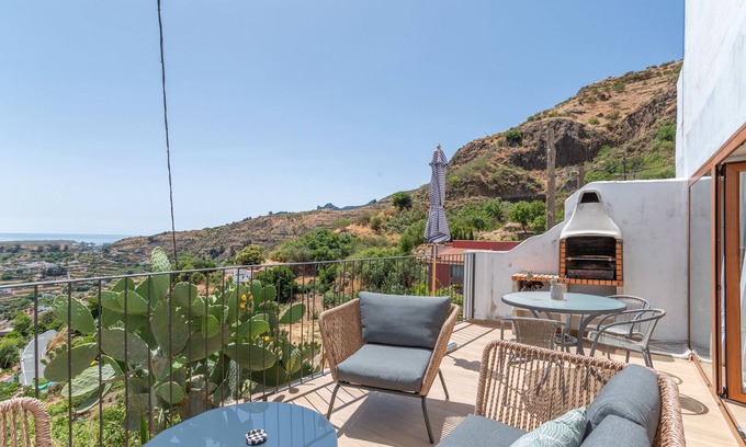 Las Lagunetas Apartamento | Vacaciones 'La Madriguera Fuente Hervera' con vistas a la montaña, Wi-Fi y aire acondicionado