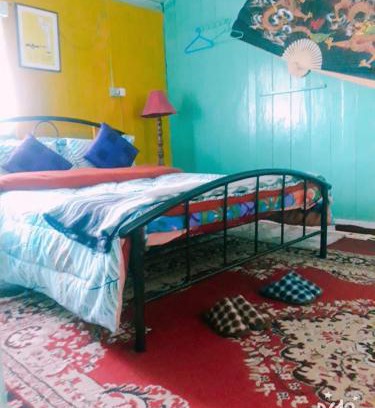 Darjeeling Hotel | Vamoose Quaint Wood Cottage
