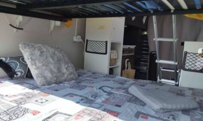 Millenaire Casa | Van set up in a PUBLIC parking lot that's good for repairs