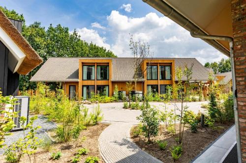 Wekerom Villa | Veluwe Villa met Binnenzwembad & Wellness XL | 24 personen | Rolstoelvriendelijk