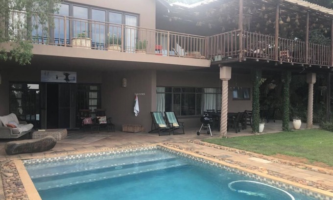 White River Casa | Versot "loco por nuestro lugar" en afrikaans