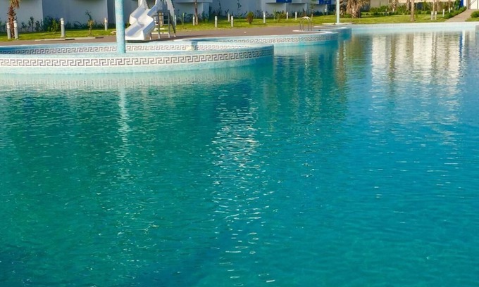 Cabo Negro Apartamento | Muy encantador apartamento con aire acondicionado y vista a la piscina en CaboNegro para familias