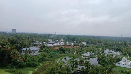 Kumbalam Apartamento | Veu Ragamalika Apartment with Fully Equipped Kitchen, Balcony & Caretaker
