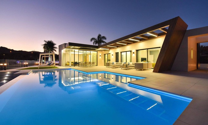 San Bartolome de Tirajana Villa | Villa Salobre Lux | Luxury Retreat in Gran Canaria | Private Outdoor Pool | BBQ Facilities | Shaded Outdoor Dining Area | Salobre Golf Resort