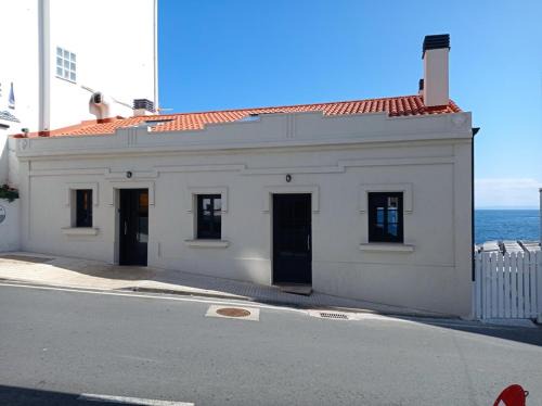 Laracha Apartamento | Vila Mariña. Casa marinera con terraza sobre el mar en Caión