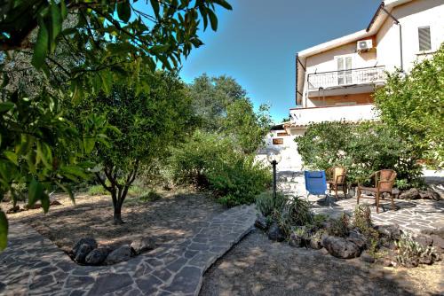 Cala Liberotto Apartamento | Villa Arancio