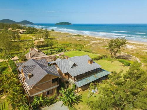 Barra de Ibiraquera Casa | Villa Bali Casas pé na areia
