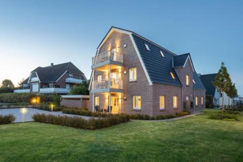 Timmendorfer Strand Apartamento | Villa Dornkamp 1 - Luxuriöse Ferienwohnung für 4 Personen inklusive Sauna und Garten