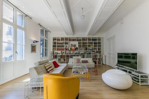 Ecusson Apartamento | Villa jeu de paume - Première conciergerie
