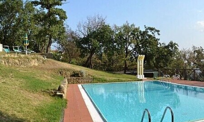 Pian di Sco Villa | Villa Mariolina Grande: Una antigua granja característica y acogedora en dos plantas situada en una posición aislada en las laderas de una colina cubierta de olivos.