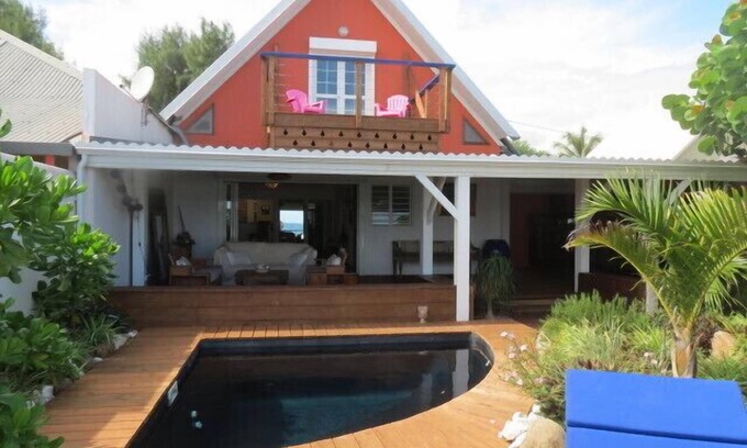 Grand Fond Villa | Villa Coral Perla con 'pies en el agua' de la piscina-spa de acceso directo a la laguna