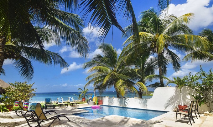 Cozumel Villa | Villa Sol Haa, Villa exclusiva frente a la playa con piscina, aire acondicionado, personal y niños amigables