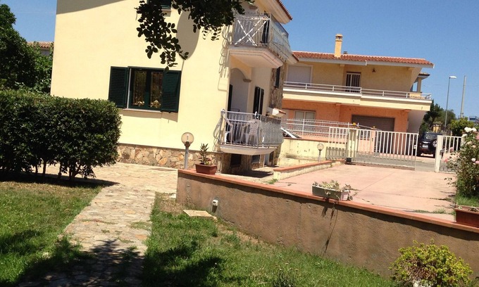 Posada Casa | Villa con jardín y plaza de parking para tus vacaciones ideales.