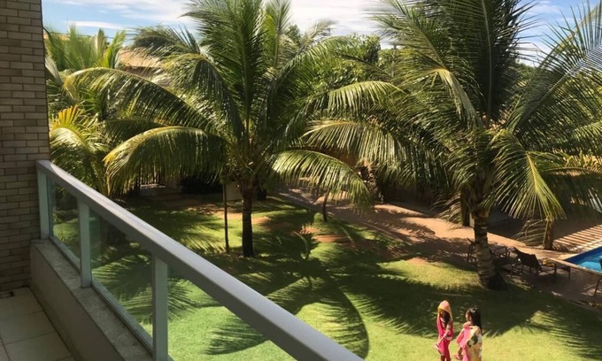 Itacimirim Apartamento | VILLAGE WITH FOUR SUITES, NEAR THE BEACH, VERY GREEN AND TRANQUILITY
